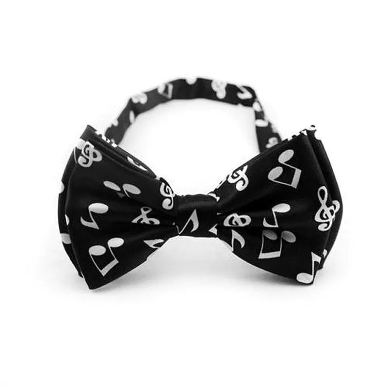 Motýlek černý s bílými notami a houslovými klíči