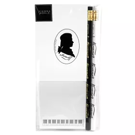 Sada psacích potřeb bílé a černé tužky s notami a lepícím bločkem s klaviaturou - partitura Mozart