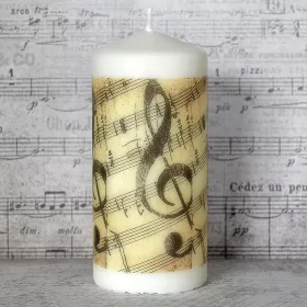 Svíčka oválná bílá přírodní černý houslový klíč s béžovými notami 15x7 cm