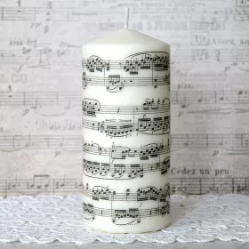Svíčka oválná bílá přírodní s notami a partiturou 15x7 cm