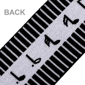 Guma - pruženka černobílá houslové klíče noty klaviatura