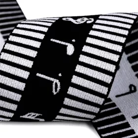 Guma - pruženka černobílá houslové klíče noty klaviatura