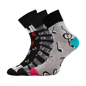 Stylové hudební ponožky v černé barvě s barevými notami, houslovými klíči a šedou klaviaturou.