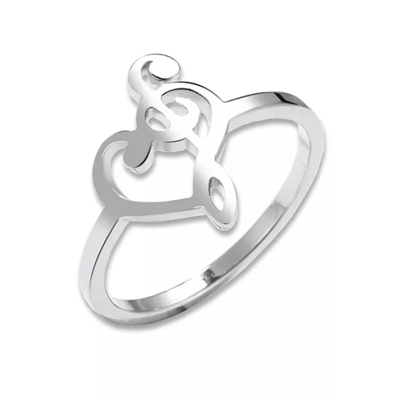 Prsten stříbrný ocel s houslovým a basovým klíčem v srdci