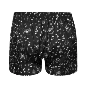 Trenky černé s bílými notami a houslovými klíči